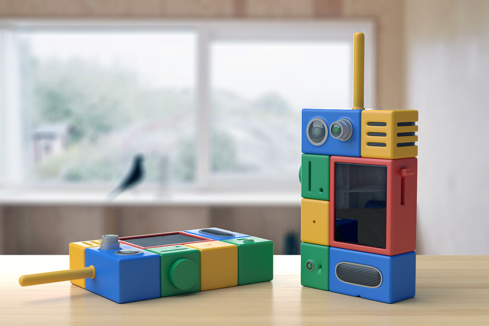 Two configurations of the Mysterious Modular Device on a wooden tabletop beside a window